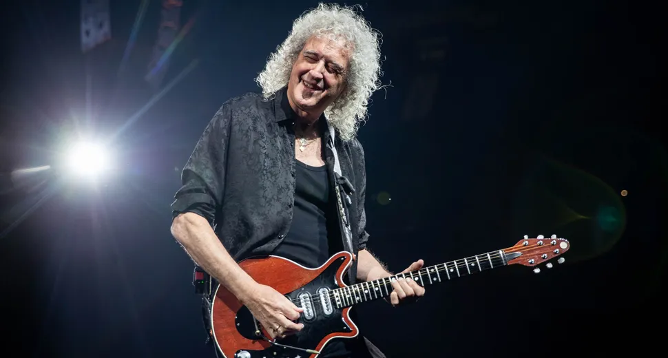 Brian May performing